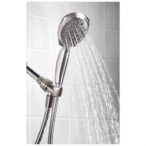four-function 4" diameter spray <b>head</b> handshower. . Moen shower head with handheld